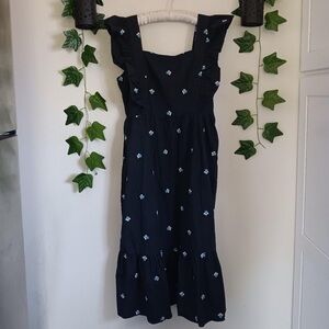 Vestique Black Midi Dress with Blue Floral Accents